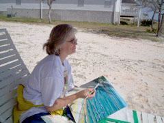 Pam Van Londen painting the bay at Navarre Beach, FL in 2006.
